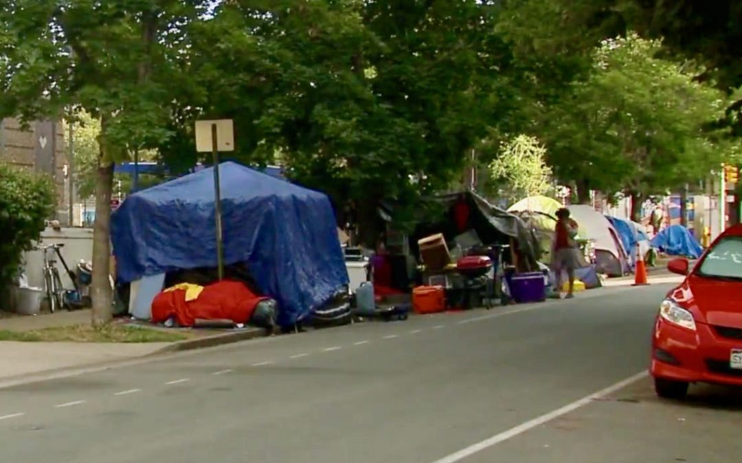 Protestors called to Morey Middle School to stop homeless sweep