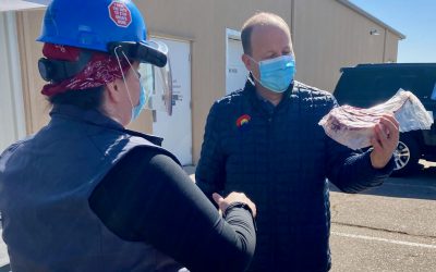 No apology: Gov. Polis stages photo op with meat workers to show he cares