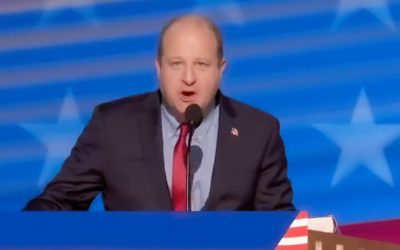 Polis violates his own law, spreads misinformation in convention speech